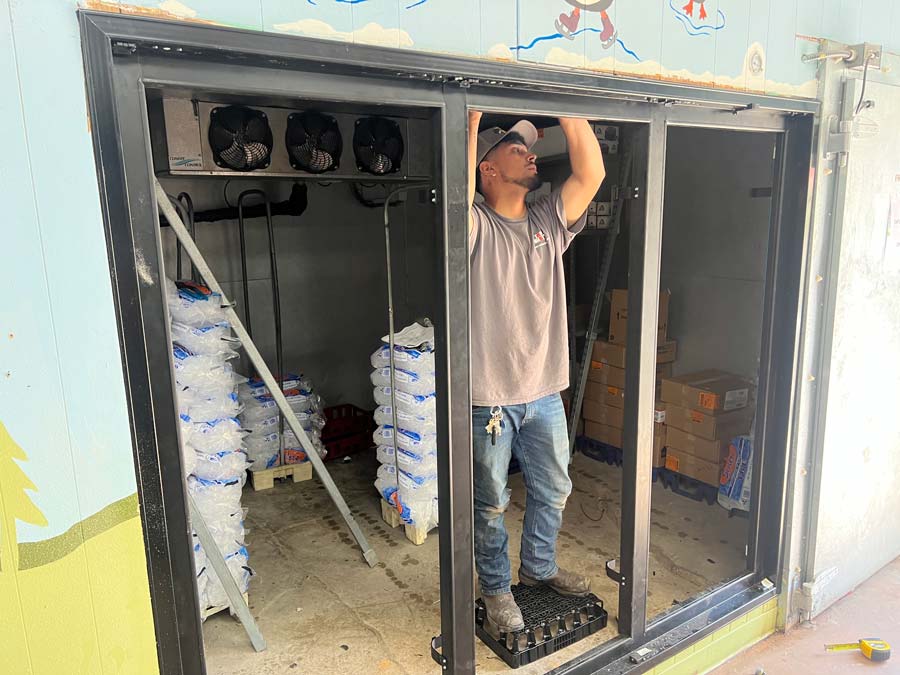 Urgent Ice Case Service by TopShot Tech with Ice Bags Stacked