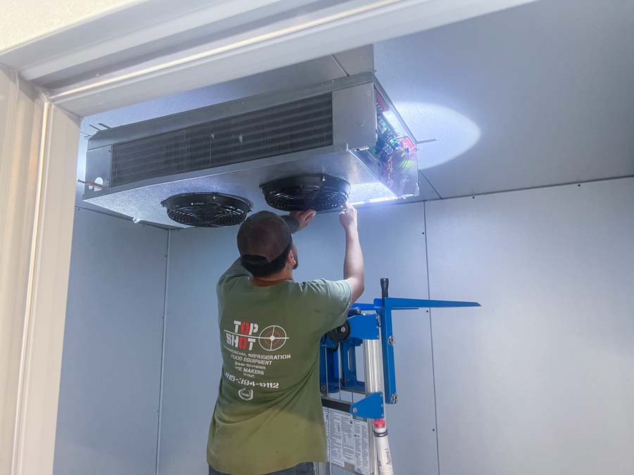 <span style="font-weight: 200;">TopShot CKR Technician Installing Fan on Newly Custom Walk-In</span>