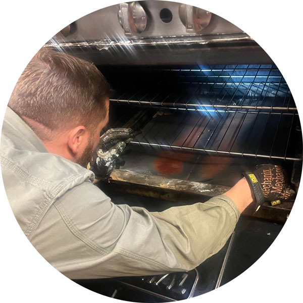 TopShot Technician Inspecting Commercial Oven During Repair