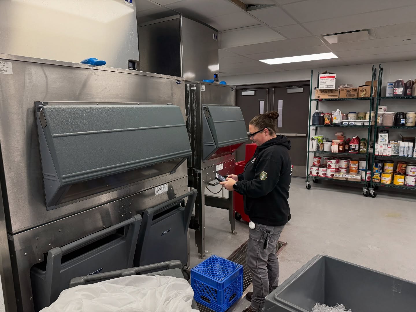 TopShot technician on-site installs a commercial ventilation system on the rooftop a professional kitchen.