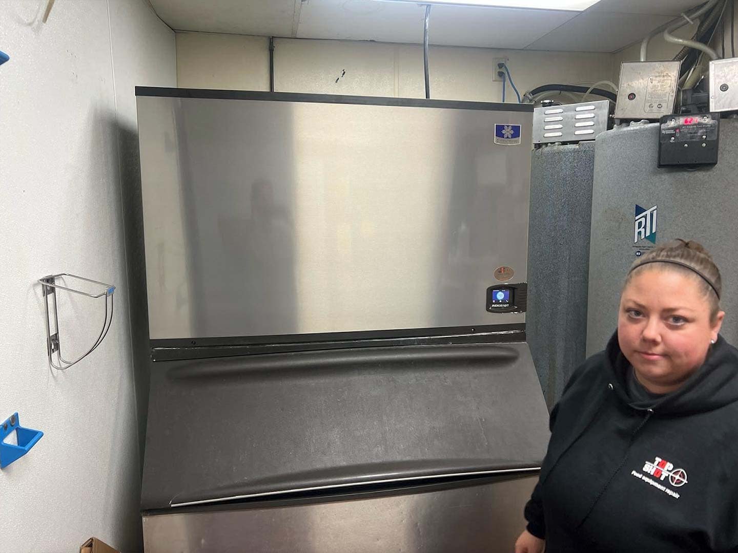 Catie Seivert Performing Ice Maker Preventative Maintenance