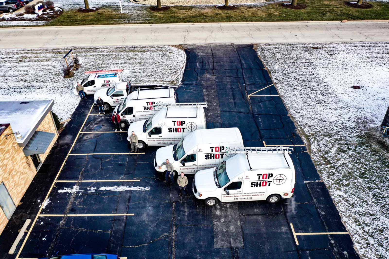 TopShot fleet - aerial view of work vehicles